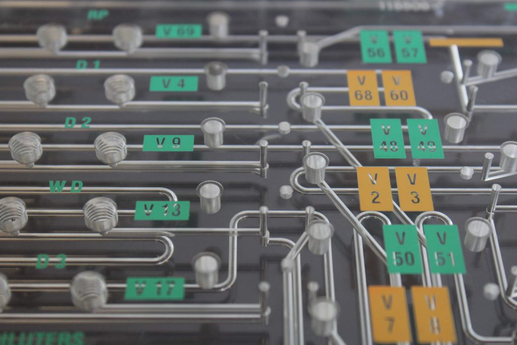 Microfluidic Channels in a Diffusion Bonded Plastic Manifold Used in Immunoassay Instruments