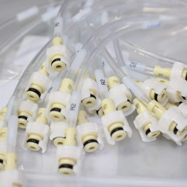 Several Plastic Tubes with Quick Disconnect Fittings for Use in Medical Equipment