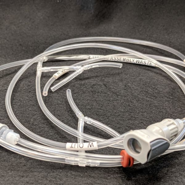 Medical Tubing Assembly for Waste Fluids with Push to Seal Adapter