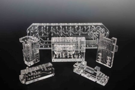 Several Examples of Plastic Diffusion Bonded Manifolds with Burr Free Pathways